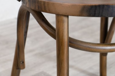 Leg of Brown Bentwood Bistro Chair